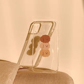 Funda transparente para teléfono con caniches triples marrones